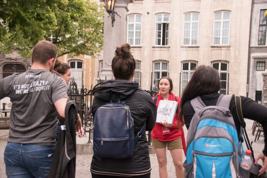 Antwerp: Private Historical Highlights Walking Tour - Starting beneath Antwerp’s guild houses