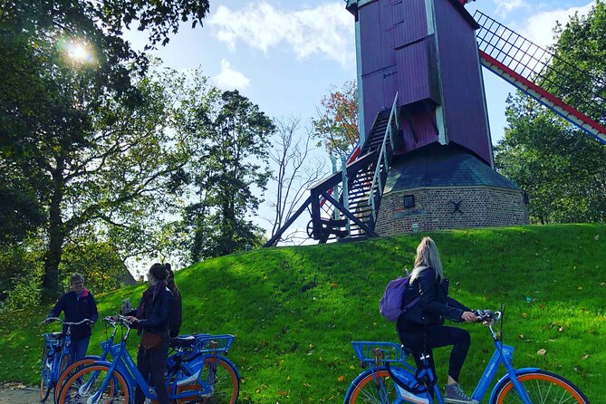 BikeTour Bruges & Damme in Spanish and English - Four windmills beside Bruges’ outer canal