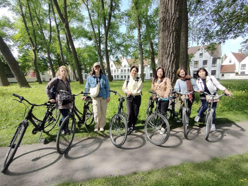 Bruges by bike with family and friends! - City walls, Kruispoort, and the windmills