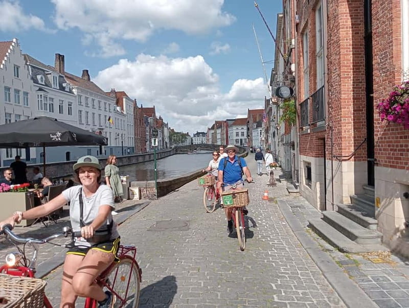 Bruges: Guided Retro Bike Tour of Highlights and Hidden Gems - Dijver, canals, and medieval bridges