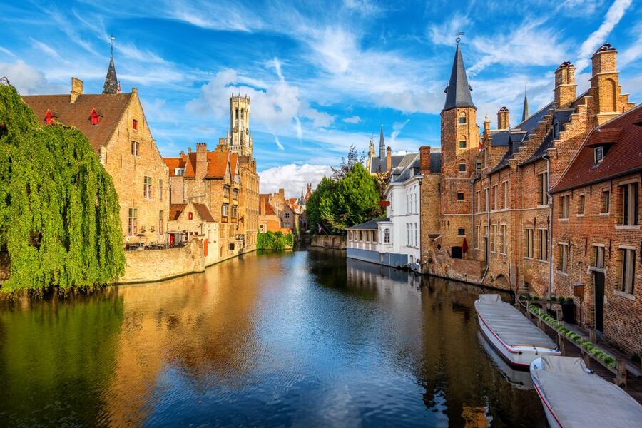Bruges: Guided Rickshaw Tour - Leaving Market Square for the city’s main sights