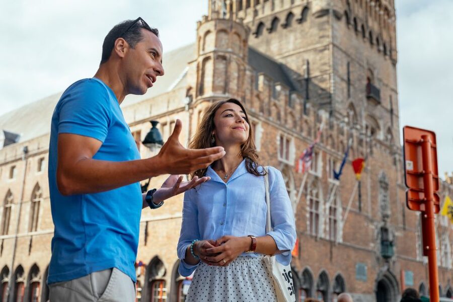 Bruges: Private Tour with Locals – Highlights & Hidden Gems - Burg Square and the civic heart of Bruges