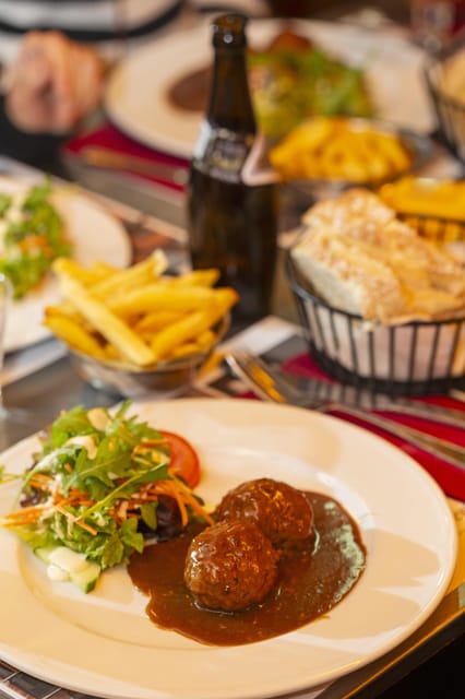 Brussels Food Tour: Main Dish, Beer, Waffle & Chocolate - Boulette and fries: a proper Brussels main dish