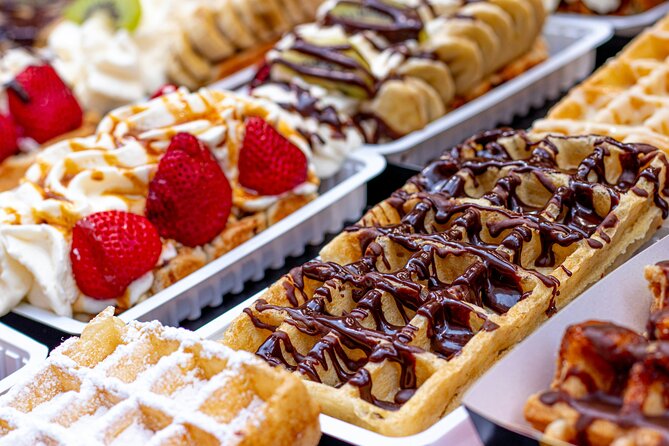 Brussels Walking Tour with Waffle Tasting: History and Delights - Sablon, boutiques, and a different side of central Brussels