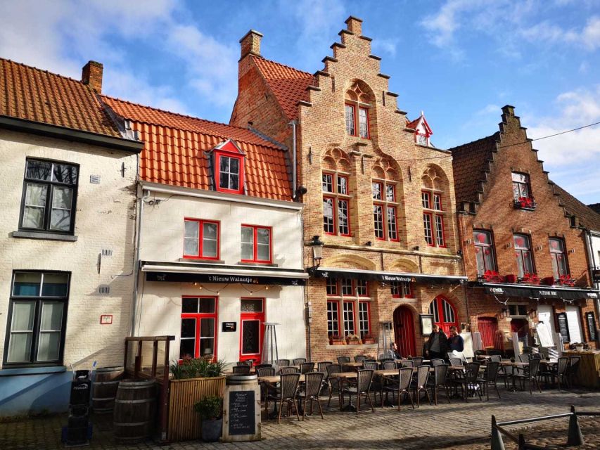 From Amsterdam: Bruges Day Trip in English with Boat Option - What the $61 price really covers