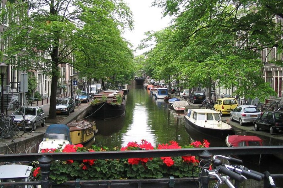 From Brussels: Cheese, Clogs & Windmills Amsterdam Day Trip - Amsterdam begins with orientation, not a full guided walk