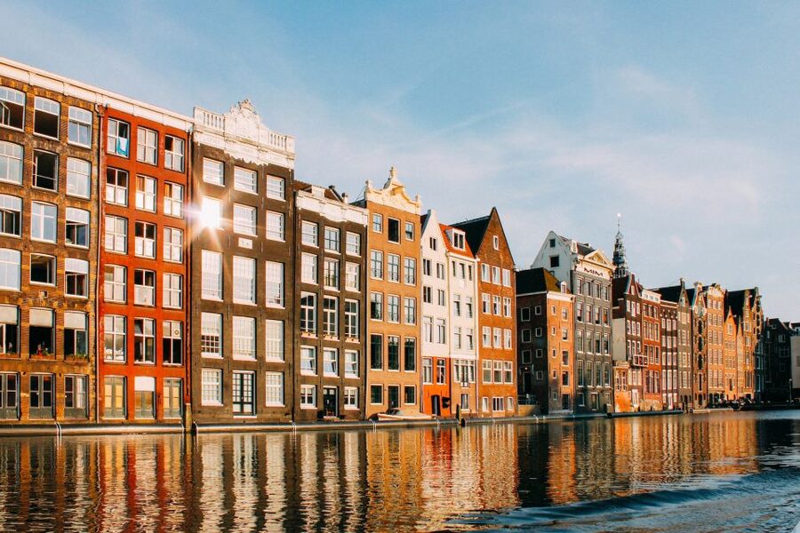 From Brussels: Cheese, Clogs & Windmills Amsterdam Day Trip - Crossing from Belgium into Dutch windmill country