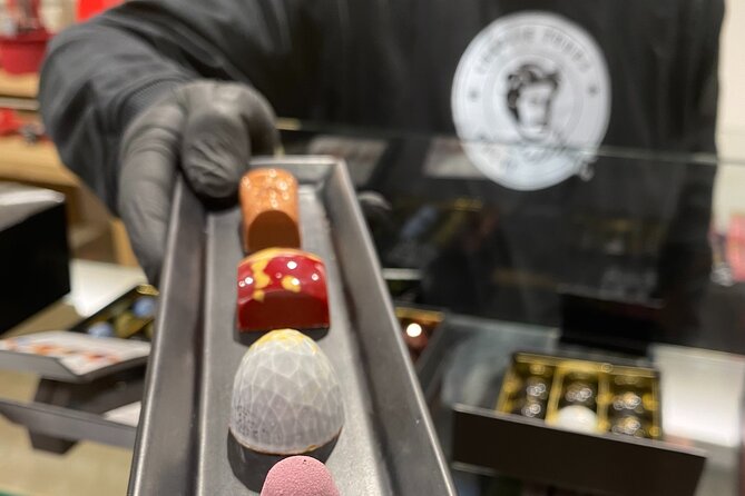 Ghent: Famous Belgian Chocolate Walking Tour with Tastings - Stop four: candy and history at Confiserie Temmerman