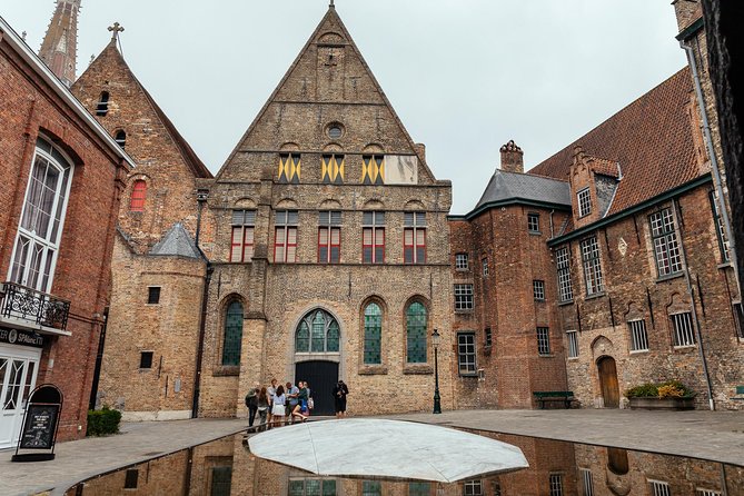 Highlights & Hidden Gems With Locals: Best of Bruges Private Tour - Canals, the oldest bridge, and Bruges from the water’s edge