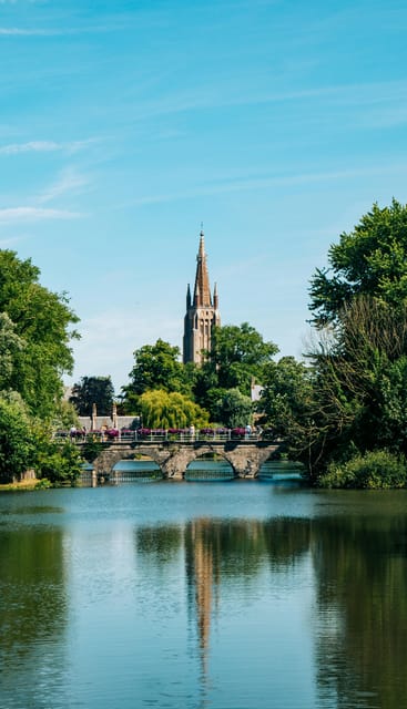 Historical walk in Bruges with local guide. Praline included - Dijver Canal and Bruges by the water