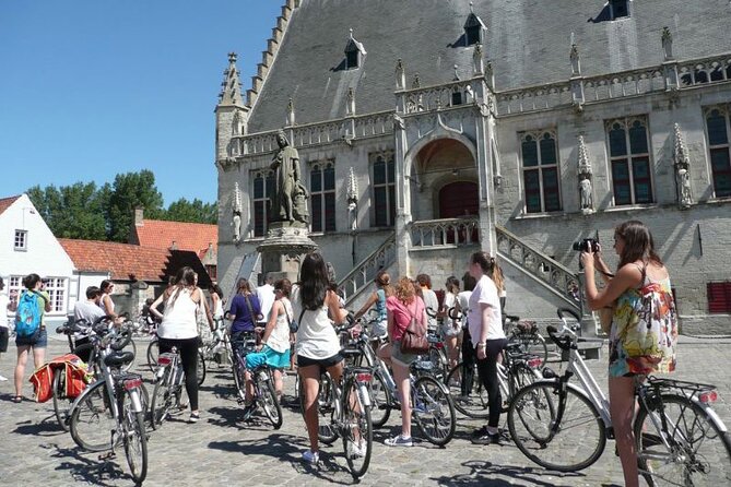 Private Bruges 3.5-Hour Guided Bike Tour: Discover Hidden Gems - Burg Square, Vismarkt, and Bruges’s working waterways